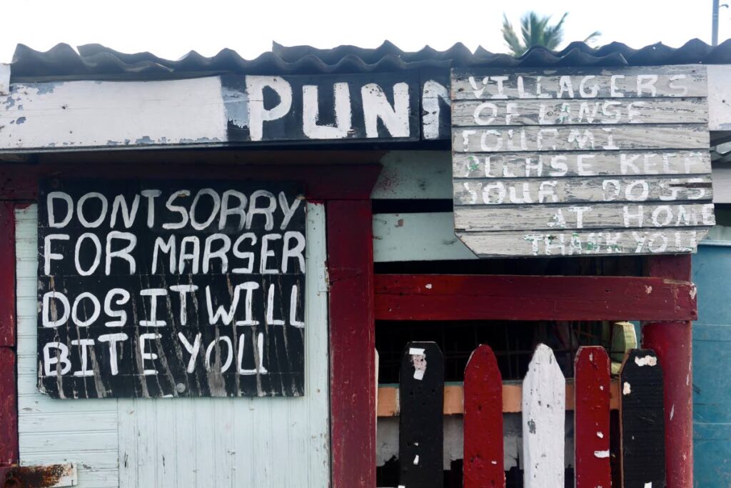  Some of the signs on the quaint shop in the rural village of L'ansee Fourmi, in Tobago.  - Elspeth Duncan