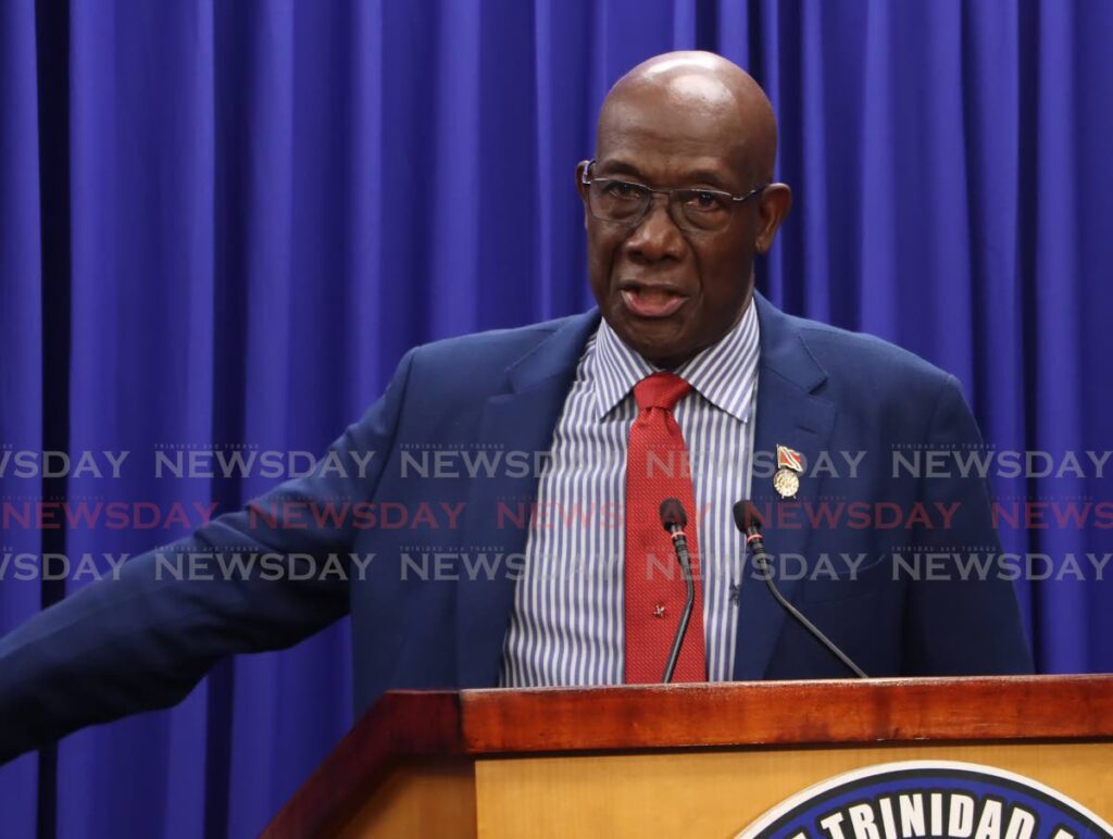 The Prime Minister speaks to reporters at a post-cabinet media briefing on December 12. FILE PHOTO/ANGELO MARCELLE - 