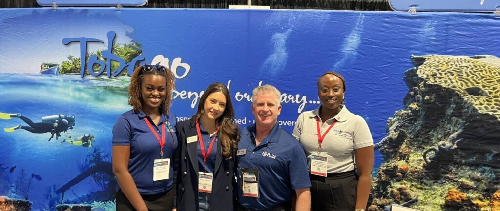 From left, Camryn Bruno, marketing officer, E-IDCOT; Ashly Brody of Professional Association of Diving Instructors (PADI) Marketing; David Benz, director, PADI Marketing; and Perl Henry, marketing officer, TTAL. -