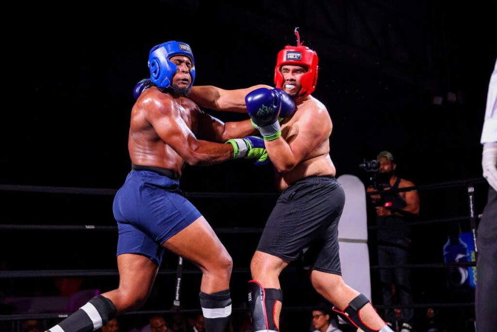 Nathan Elliot (R) battles Tyler Neptune during RABZ 6 Fight Night at the Sound Forge grounds on December 13, 2024 in St James. - DANIEL PRENTICE