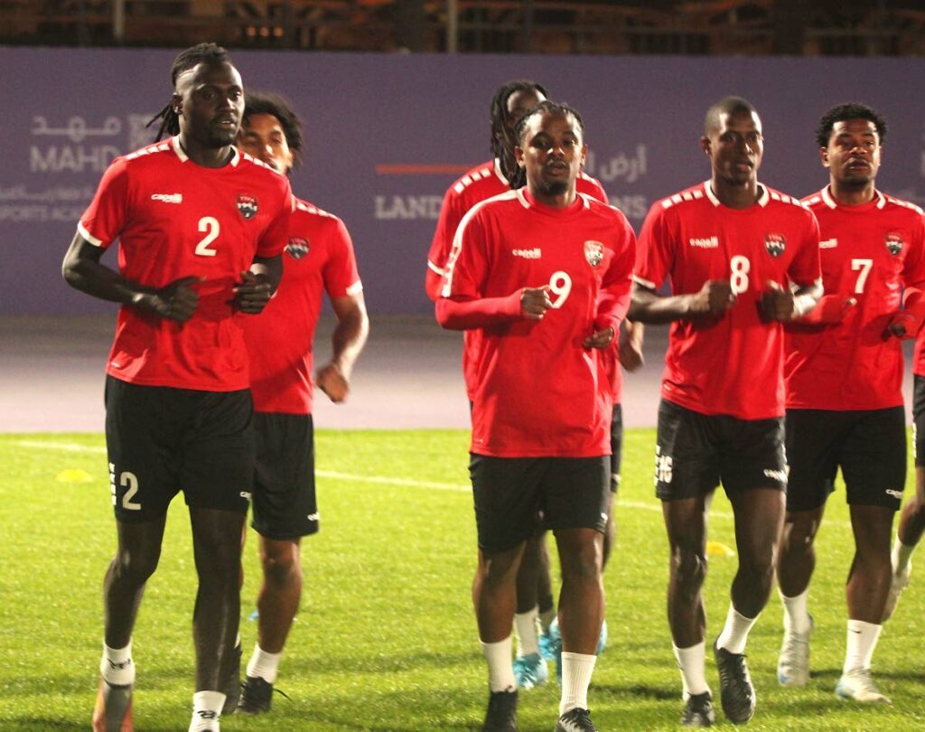 Soca Warriors captain Aubrey David (L) and his teammates go through their paces during a session at the Mahd Sports Academy in Riyadh, Saudi Arabia on December 15. Photo courtesy TTFA Media.  - 