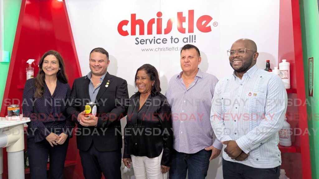 From left, Gabrielle Agostini member of the TTMA membership and marketing committee, Jonathan Garcia managing director of Christle Ltd, Paula Gopee-Scoon Trade and Industry minister, Roger Roach TTMA president, Christopher Garcia founder of Christle Ltd during the minister's tour of the warehouse on December 17. - Photo by Mya Quamie