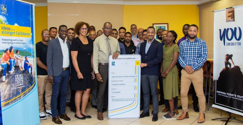 Andre Corbie, director Caribbean Client Advice Centre, RBC and co-chair, MoMENtum, centre presents Dr David Toby, founder of Esimaje Foundation with a digital receipt for a $500,000 sponsorship of Esimaje’s “You Can Do It Too” mentorship programme.
- Photo courtesy RBC