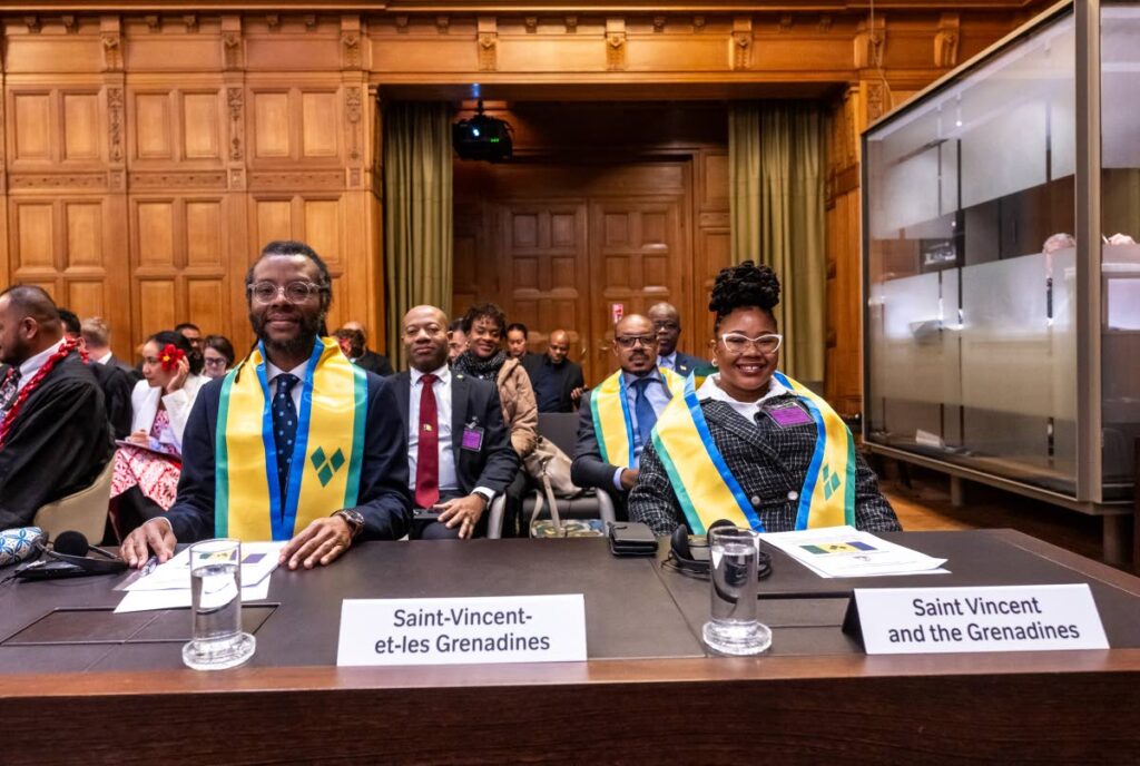 TT lawyer Dr Justin Sobion (left) and Shernell Hadaway, parliamentary Counsel III at the  Attorney General’s Chambers in St Vincent and the Grenadines (right).
 - UN Photo/ICJ-CIJ/Frank van Beek. Courtesy of the ICJ.