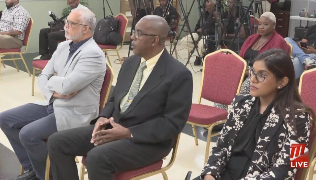 A screen-grab of the TTT YouTube feed of the National Security Ministry's press conference on Friday showing members of the three-man committee mandated to probe the circumstances surrounding the fire on December 16 which claimed the lives of D'abadie/O'Meara MP Lisa Morris-Julian and two of her children. From left are Curt Cadette, committee chairman Roosevelt Bruce and attorney Ashtie Mahabir.  - 