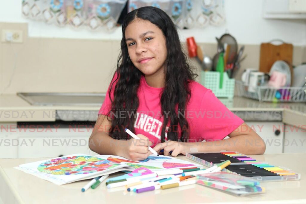 Camila Sofía Gelviz, 12, is a normal girl despite having suffered two brain tumours. She loves drawing and has hundreds of colours in her house in Couva, where she lives with her family. - Photos by Grevic Alvarado