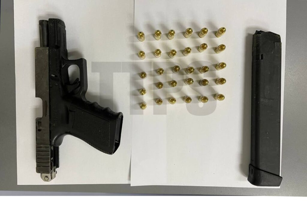 A Glock pistol and ammunition seized by police.  - 