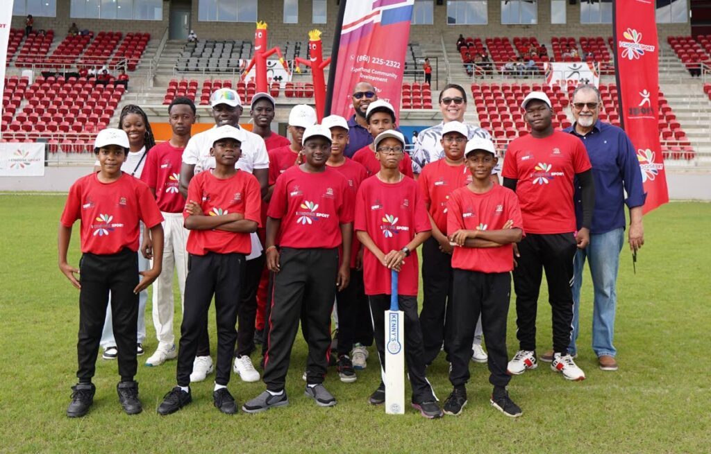 Diego Martin Conquerors players and coaches pose with the MP for Diego Martin Central Symon de Nobriga, second from right back row, along with other officials of SporTT. - Photos courtesy SPORTT  