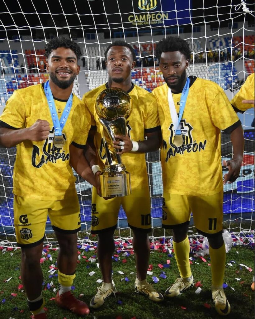 Trinidad and Tobago midfielder Jomal Williams (C) shares a moment with his teammates after clinching the 2024 Salvadoran Primer Division Apertura title on December 21. Photo courtesy Jomal Williams ' Instagram page.  - 