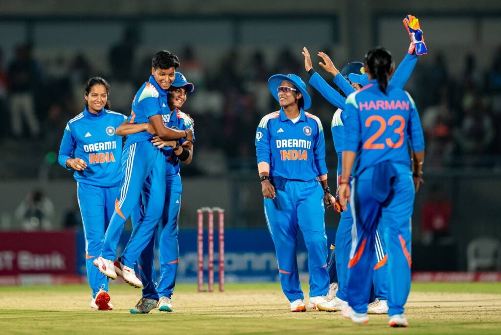 Priya Mishra of India is lifted by a teammate after taking the wicket of Rashada Williams of the West Indies during the 2nd ODI  at the Kotambi Stadium, Vadodara, India on December 24. - Photo courtesy BCCI