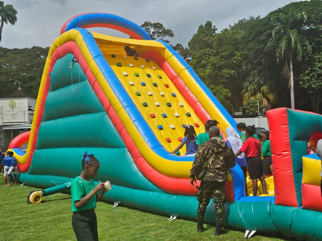 Children enjoying activities at the Christmas party hosted by President Christine Kangaloo at President’s House grounds on December 3. - Photo courtesy Office of the President