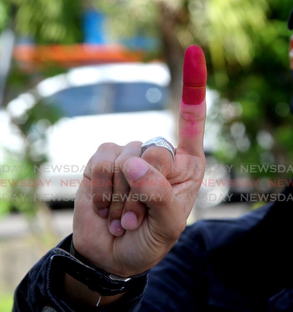 Finger stained in red ink from voting - File photo