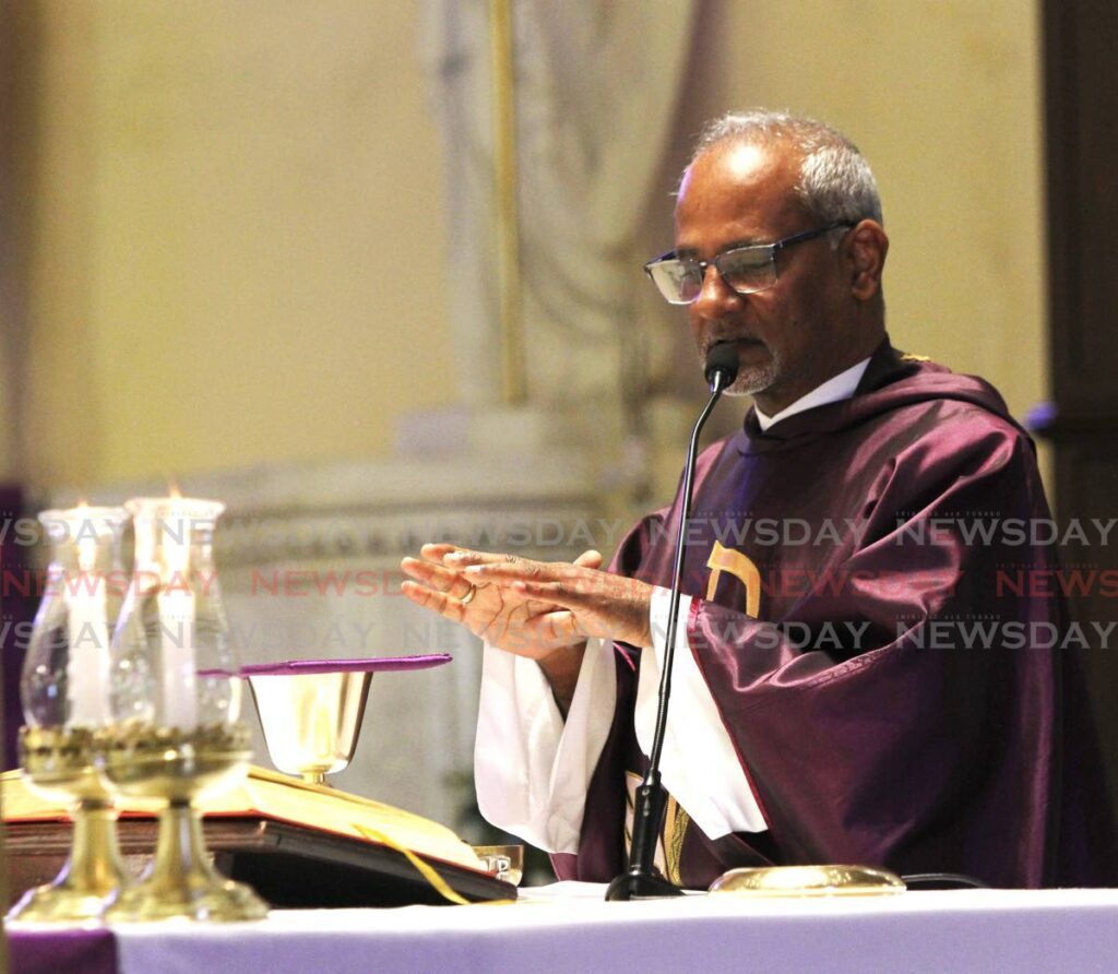 Vicar general of the RC Archdiocese of Port of Spain Fr Martin Sirju. - File photo