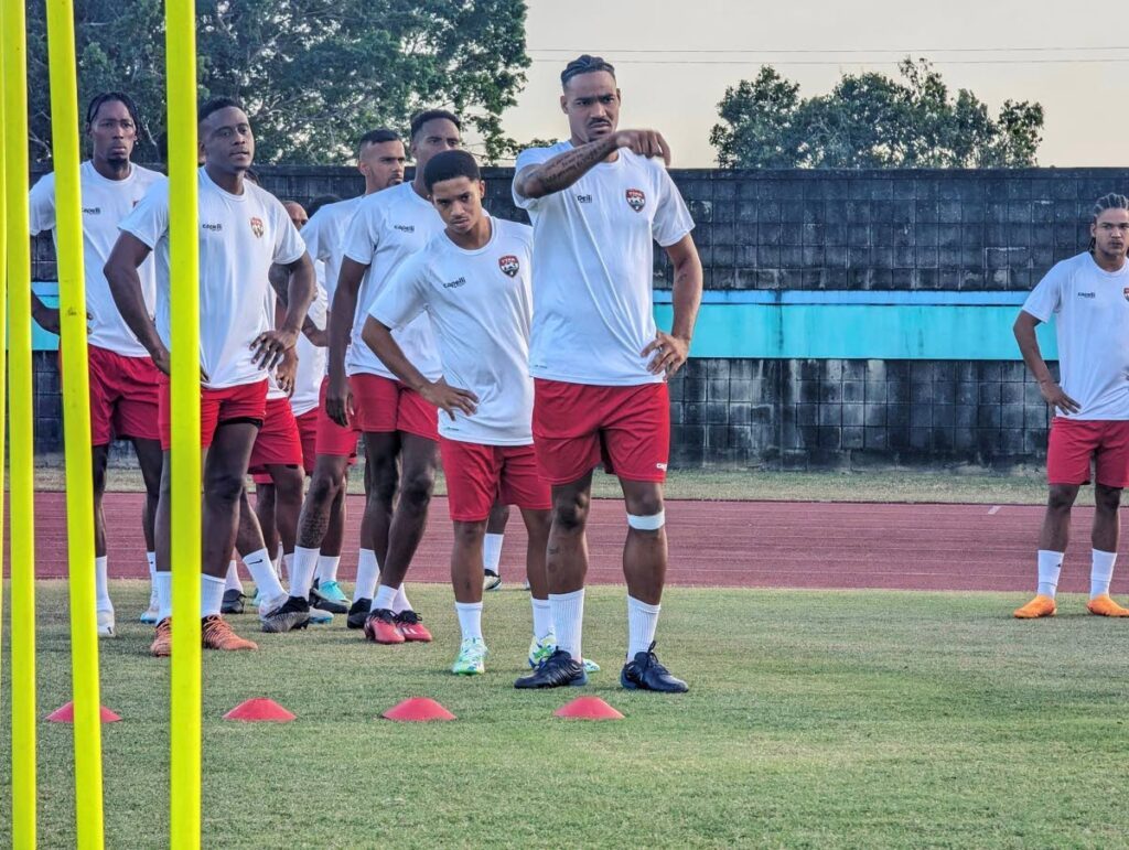 TT's Alvin Jones, front, leads a group of players during a national senior men's football team training session, at the Manny Ramjohn Stadium, Marabella. - Photo courtesy TTFA Media