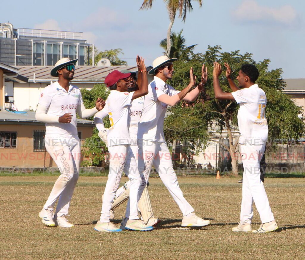 In this March 12, 2024 file photo, Presentation College Chaguanas players celebrate a wicket in their match against Presentation College San Fernando in the SSCL premiership final, at Presentation College Grounds. - Photo by Angelo Marcelle