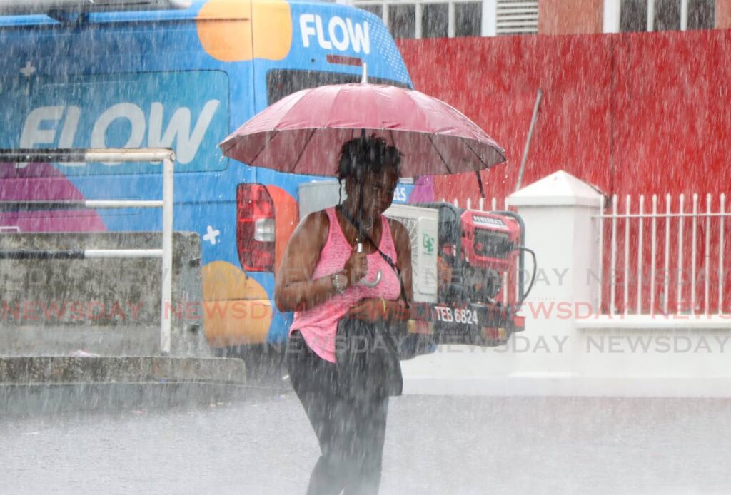 The Met Office has issued a yellow-level weather alert, saying periods of rain with a moderate chance of isolated heavy showers or thunderstorms are expected to intermittently affect Trinidad and offshore areas, east and south, over the next three days. - File photo by Ayanna Kinsale