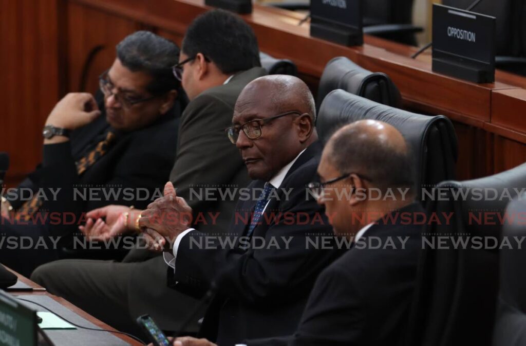 Rodney Charles, second from right, in Parliament. FILE PHOTO/FAITH AYOUNG - 