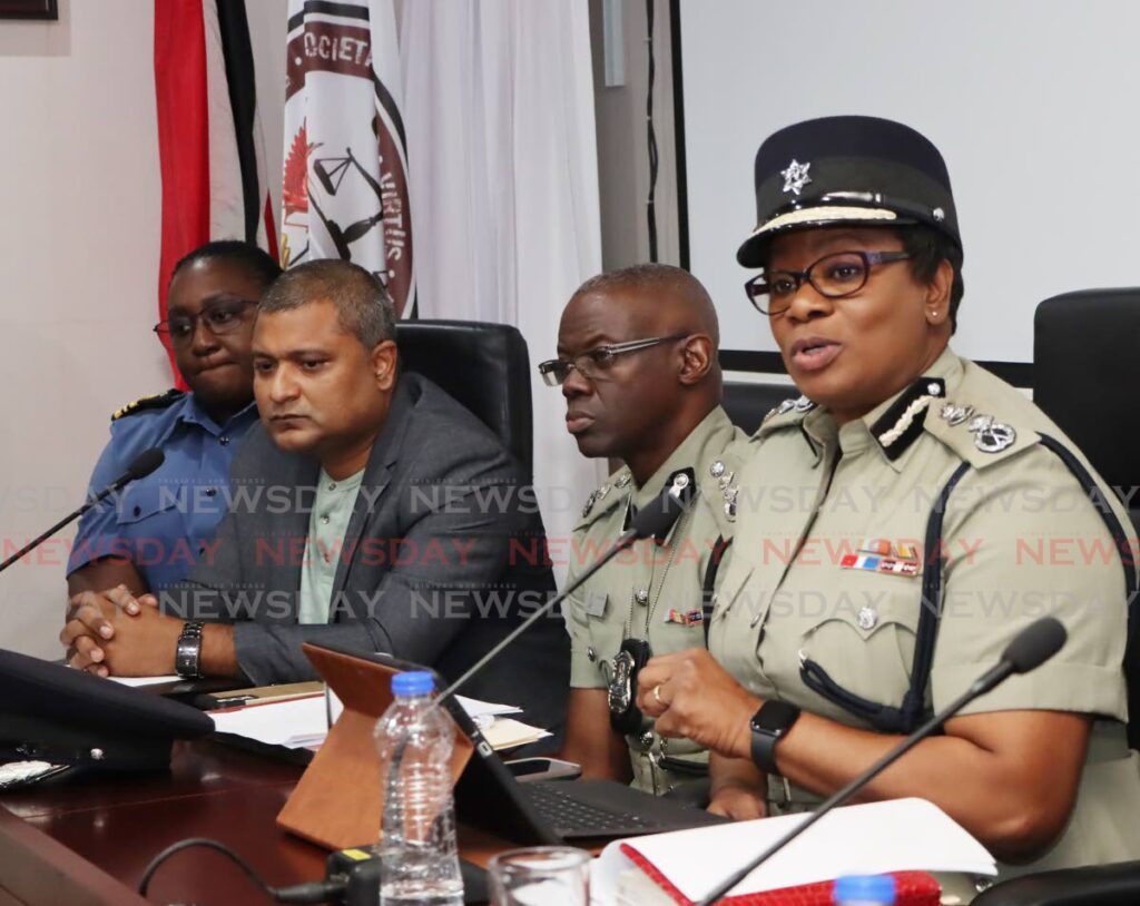 I GUARANTEE: Police Commissioner Erla Harewood-Christopher makes a point during a press briefing on Tuesday at Knowsley building, Port of Spain. Also in the photo are, from left, Lt Cdr Sherisse Moore, Ag Sgt Zaheer Ali and DCP Junior Benjamin. PHOTO BY AYANNA KINSALE - Ayanna Kinsale