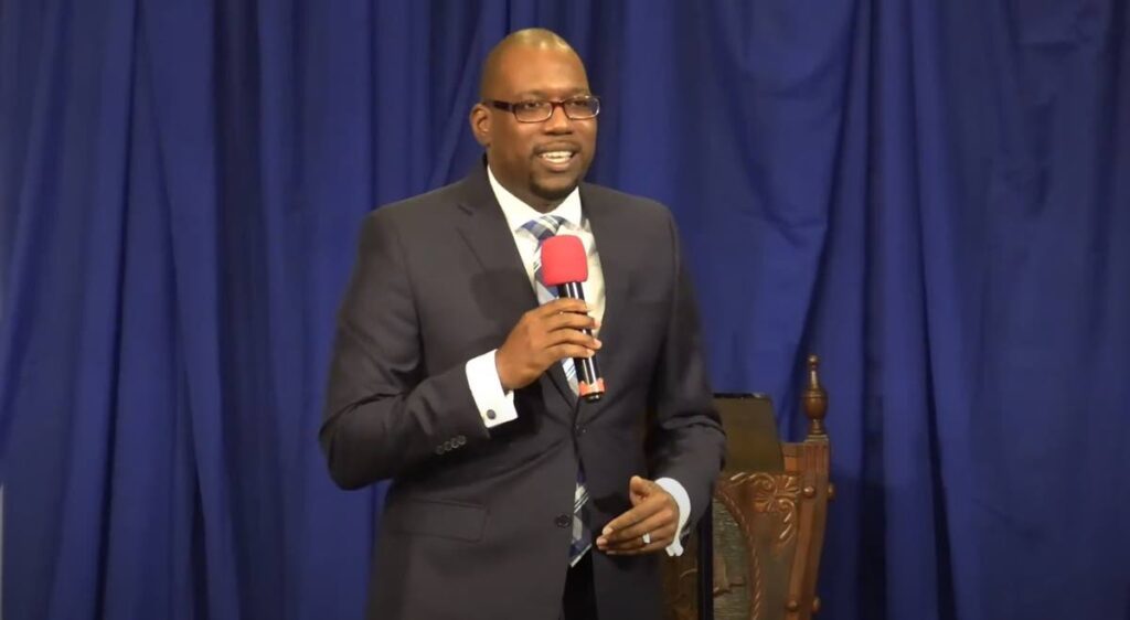 Randall Hector shares his testimony during a service at the Seventh-day Adventist Church, Stanmore Avenue, Port of Spain on December 31. He was shot dead after the service. - Photo courtesy the Stanmore SDA Church YouTube Channel