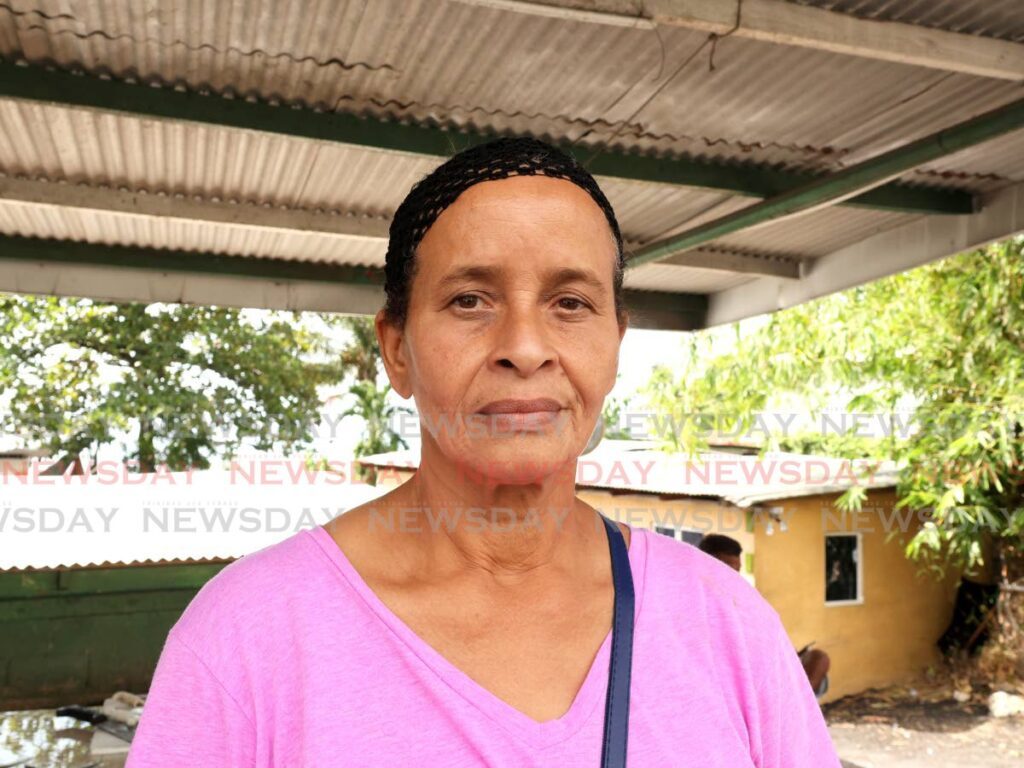 L'Anse Mitan, Carenage resident Marcia Gorrin-Plowden speaks with Newsday on January 4, the day after the Prime Minister, who is her MP, announced his intention to step down. - Photos by Faith Ayoung