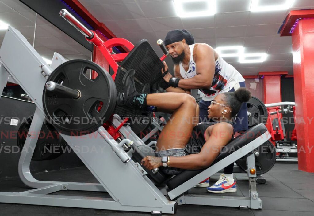 Shiam C Form, personal instructor trains Michaela Modeste at CLX Gym on Edward Street, Port of Spain on January 8. - Photo by Faith Ayoung