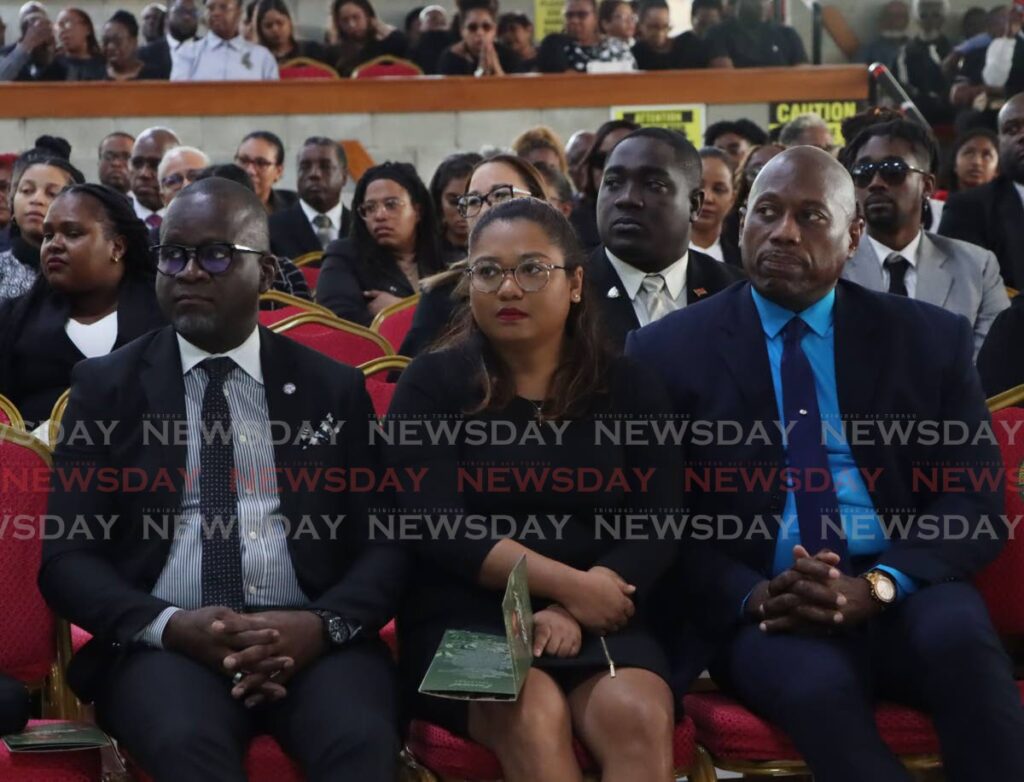 Director of Public Prosecutions (DPP) Roger Gaspard, SC, right, sits among mourners at the funeral of attorney Randall Hector at the University of the Southern Caribbean, Maracas St Joseph, on January 9. - Photo by Ayanna Kinsale