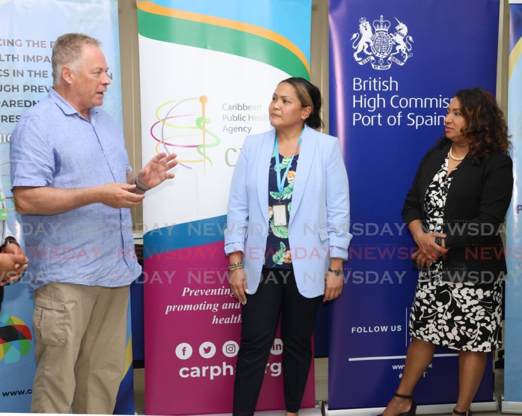 Dr Matthew Dryden, lab specialist at the UK Health Security Agency, Dr SueMin Nathaniel, acting head of labororatory services at Carpha and Dr Lisa Indar, acting interim executive director at Carpha, right, at Carpha's laboratory, Federation Park, Port of Spain on January 10.
 - Faith Ayoung