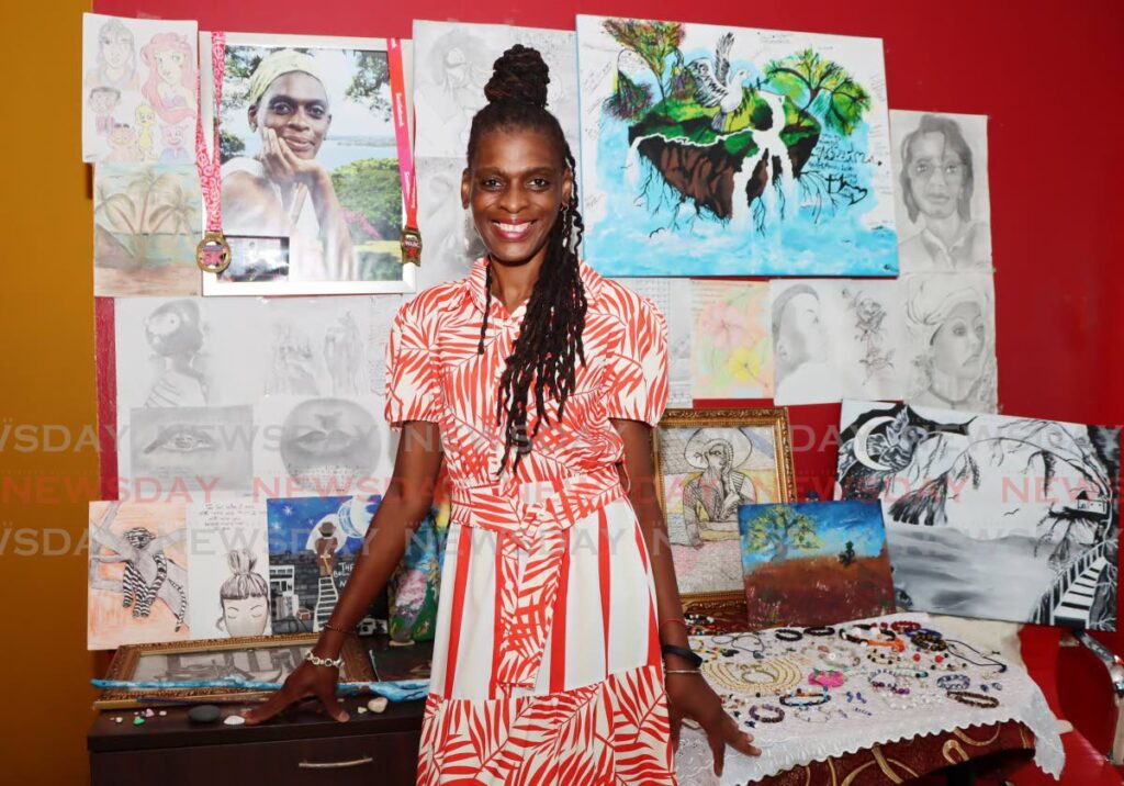 Cancer survivor and artist Andra Wilson with her artwork at her home in Greenvale Park, La Horquetta on January 10. - Photos by Ayanna Kinsale