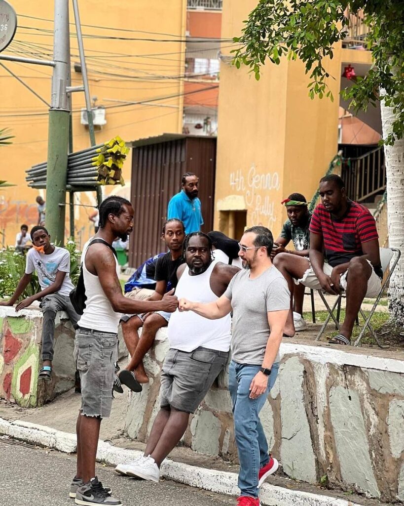 Port of Spain North/St Ann's West MP Stuart Young talks with residents of his constituency on January 10. - Photo from Young's Facebook Page 