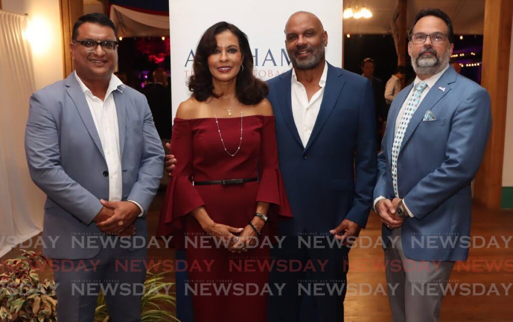 From left, Amcham CEO Nirad Tewarie, US Ambassador Candace Bond, her husband Steven McKeever and Amcham chairman Stuart Franco at the chamber's annual US Ambassador's reception at Trinidad Country Club, Maraval on January 10. - Photo by Angelo Marcelle