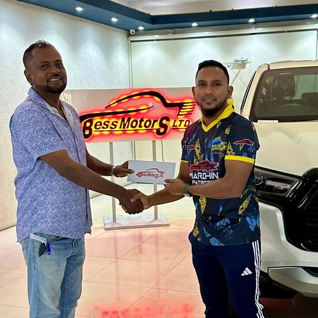 Bess Motors Ltd owner Ian Maharaj, left, presents Bess Motors Marchin Patriots president Adrian Ali with a sponsorship cheque for the 2025 cricket season.  - Photo via Bess Motors Marchin Patriots 