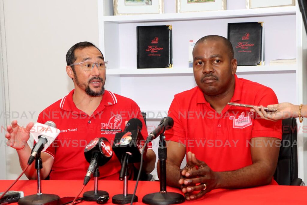 PNM chairman Stuart Young, left, and general secretary Foster Cummings address the media at the party's post-general council media briefing at Balisier House, Port of Spain on January 11. - Photo by Ayanna Kinsale