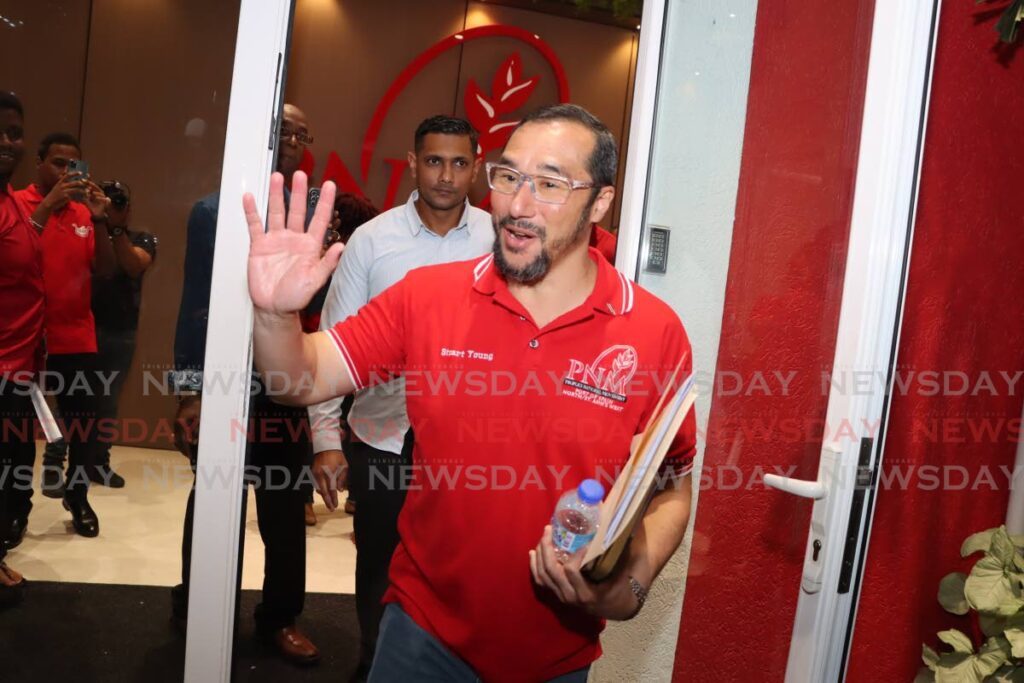 PNM chairman Stuart Young acknowledges reporters as he left Balisier House, in Port of Spain on January 11. - Photo by Ayanna Kinsale