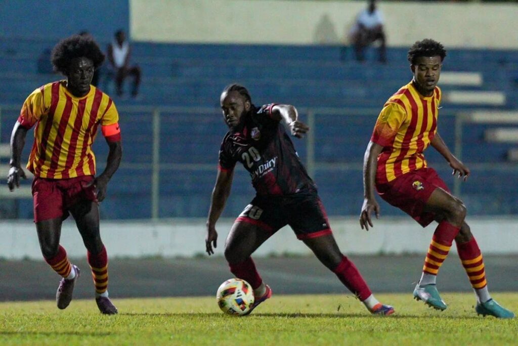 AC Port of Spain’s Che Benny controls the ball against defensive pressure from Point Fortin Civic during their TT Premier Football League match, on January 12, 2025 at the Arima Velodrome, Arima.  - Photo courtesy TTPFL