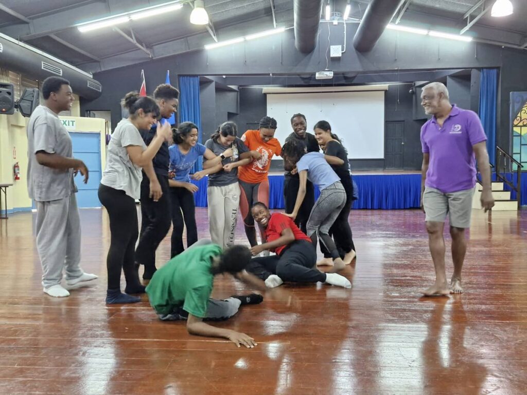 Director Victor Edwards conducts team-building sessions with the Beauty and the Beast crew for the production which is being staged by Naparima Girls' High School at the Naparima Bowl, San Fernando, from January 16-19. - 