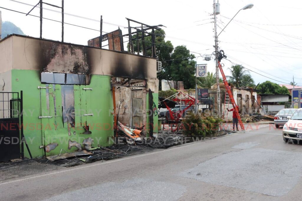 The remains of Bernie's Brewery after fire burnt the structure at it's Concord Road, Saddle Road, San Juan location on January 14.  - Photo by Angelo Marcelle