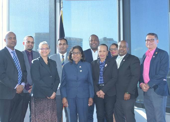 Front row: Neville Alexander, assistant director trade promotion and development, MTI, left;  Ava Mahabir-Dass, deputy acting PS, MTI;  Paula Gopee-Scoon, Trade Minister; Dianne Joseph, TTCSI president; Daren Lee Sing, CEO, TTCSI; Kiran Singh, treasurer, TTCSI. Back row: Christopher Rajh, senior economist, MTI, left; Randall Karim, PS, MTI; Ramon Gregorio, director, TTCSI; and Oneika Bushell, secretary to the board, TTCSI. Photo courtesy MTI - 