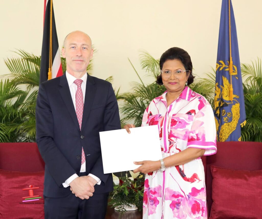 Jon Mark Dean, high commissioner-designate of UK to TT, presents his credentials to President Christine Kangaloo on January 16 at President's House, St Ann's. - Photo courtesy President's House