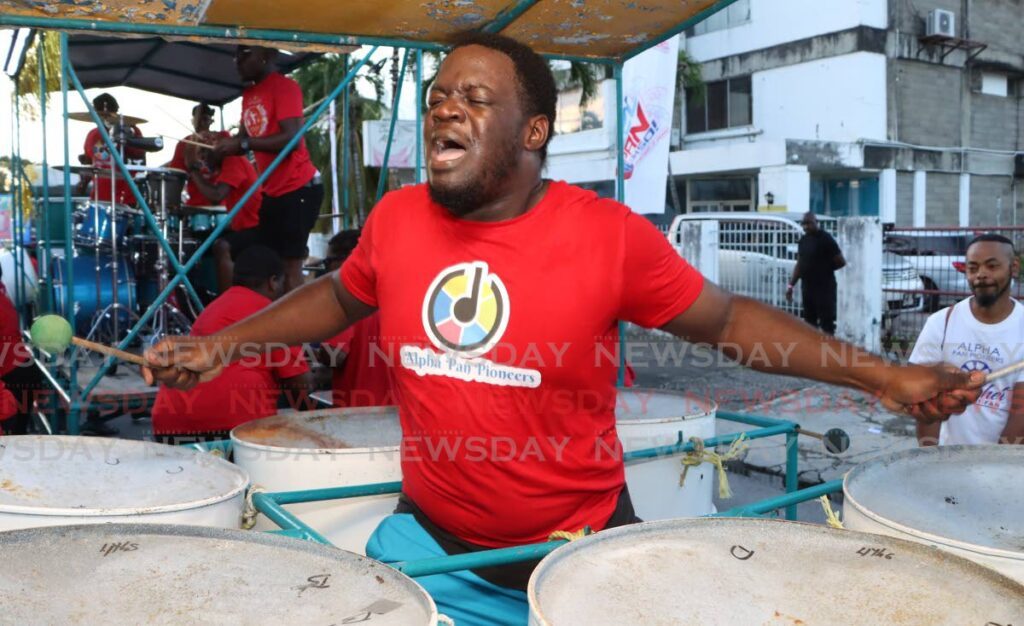 A bass man from Alpha Pan Pioneers plays during the band's performance of Sweet Soca Man, during the Panorama national  small-band semifinals, at Victoria Square, Port of Spain on January 18. - Photo by Angelo Marcelle