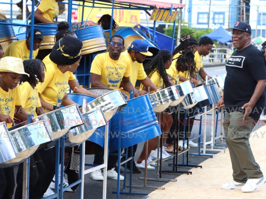 Arima Golden Symphony arranger BJ Marcelle leads the players at the front line as they play Gold at Pan Trinbago’s Small Bands semifinals, at Victoria Square, Port of Spain on January 18.  - Photos by Angelo Marcelle