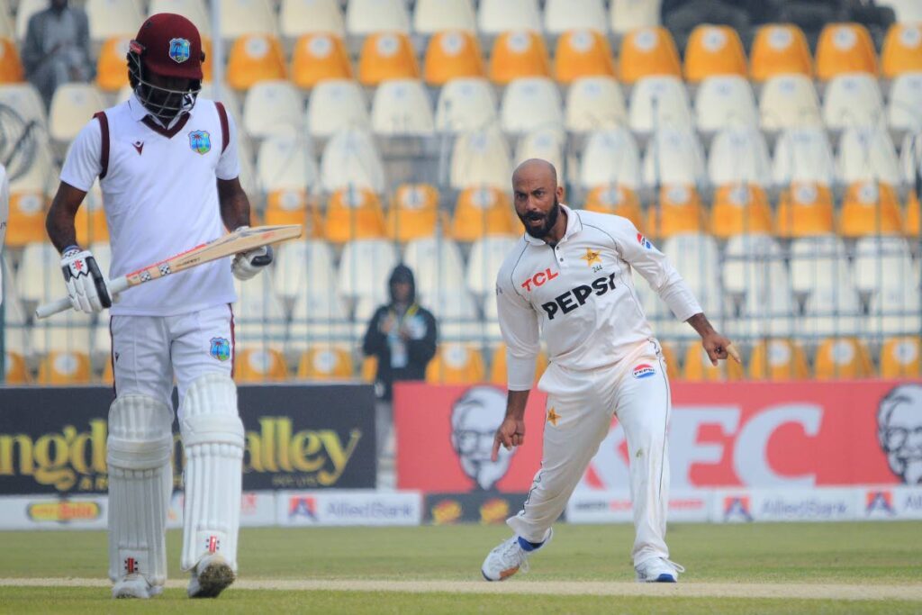 Pakistan's Sajid Khan, right, celebrates after taking the wicket of West Indies captain Kraigg Brathwaite during day three of the first Test match between Pakistan and West Indies in Multan, Pakistan on January 19. AP PHOTO - 