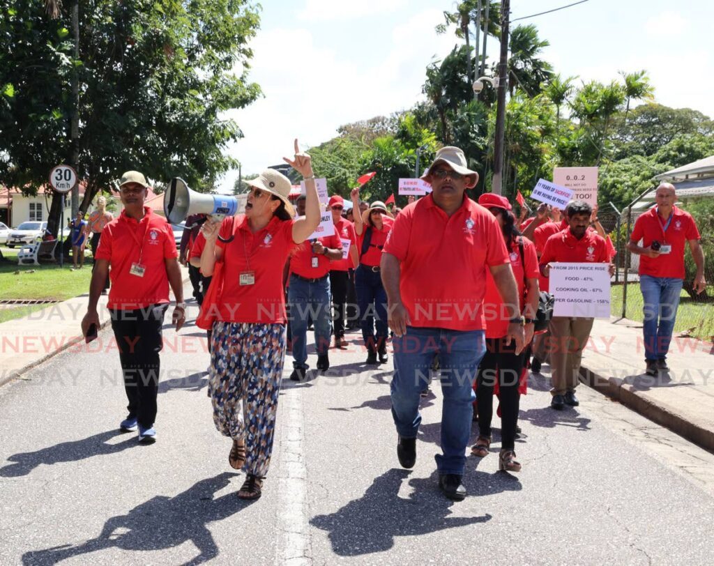 WIGUT members march in protest over outstanding salary negotiations at the UWI St Augustine campus on January 20 - Photo by Faith Ayoung