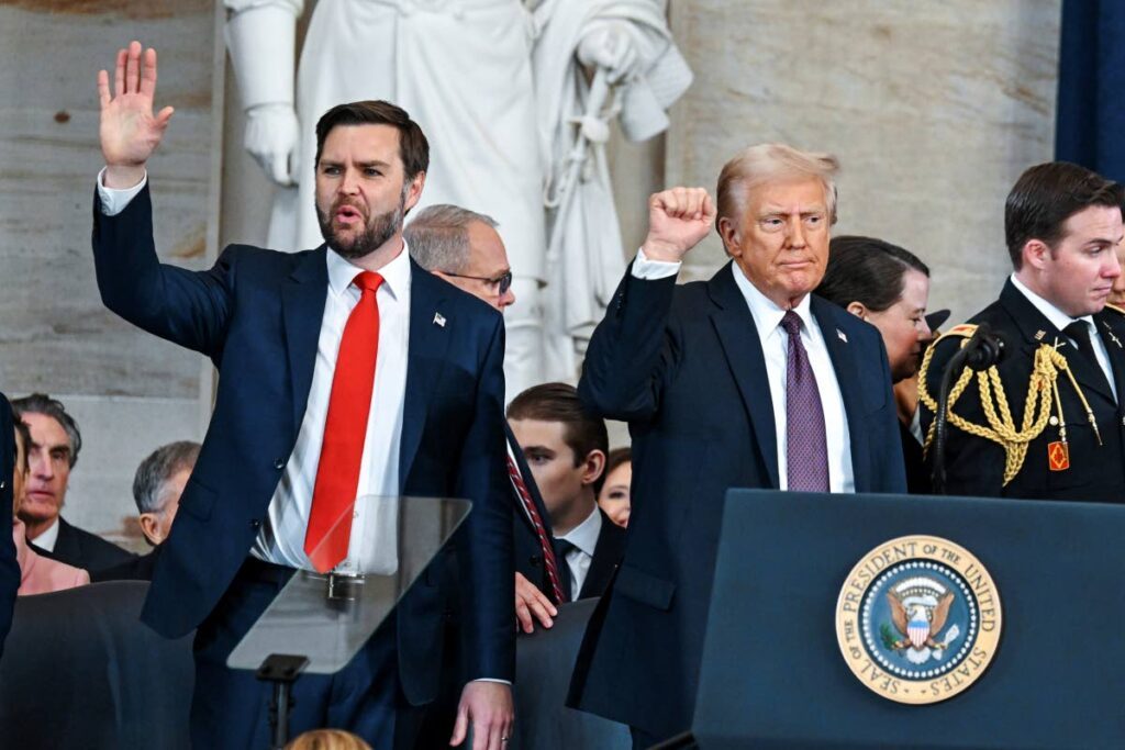 President Donald Trump, splendid, and Vice President JD Vance gesture to attendees for the period of the sixtieth Presidential Inauguration within the Rotunda of the US Capitol in Washington, on January 20. - AP Photograph