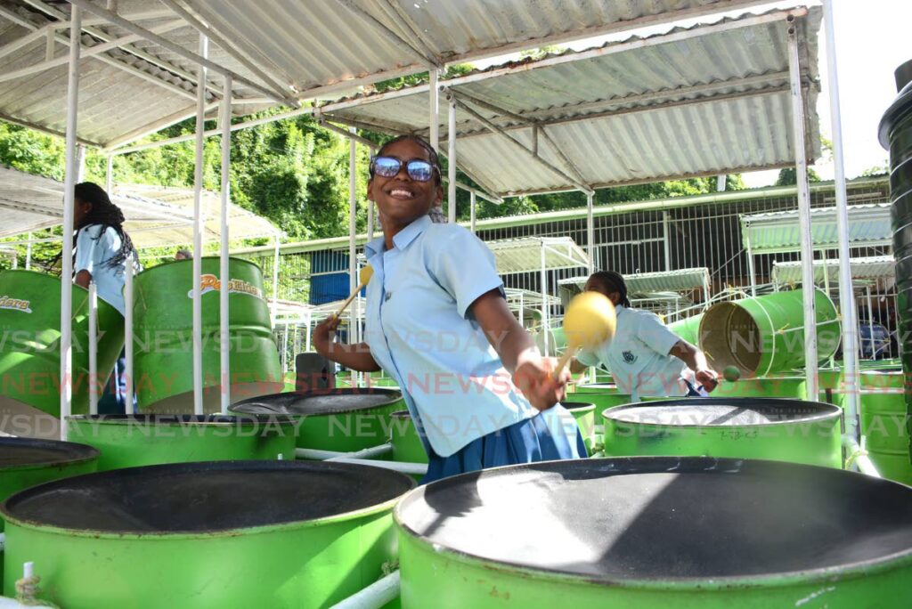 Pure enjoyment as La Romaine Secondary School pannists play Machel Montano's Fog at Pan Elders' panyard, Coffee Street, San Fernando, on January 22.  - Photos by Innis Francis