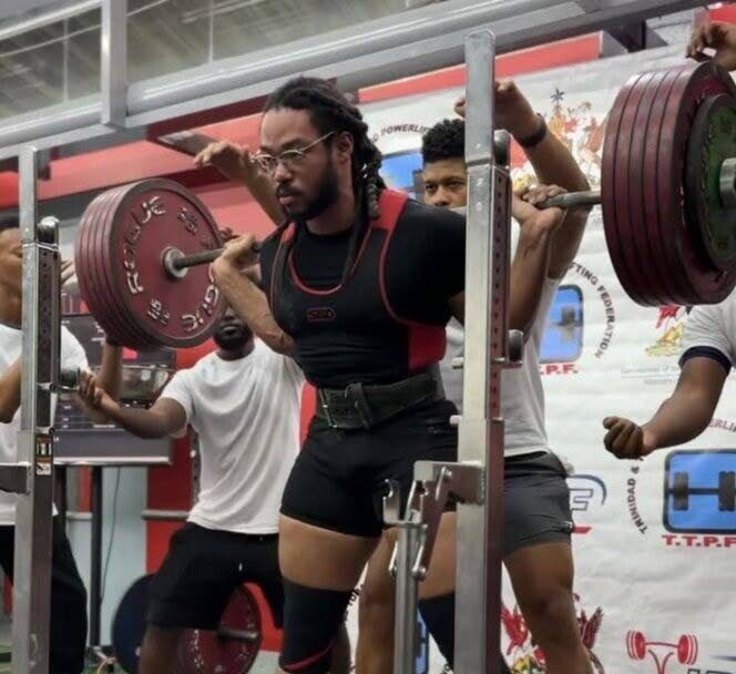 In this file photo from February 2024, Yavniel Yatali lifts during his winning performance in the men's category at the 2024 National Powerlifting Championships in Trincity. - Photo courtesy TTPF 