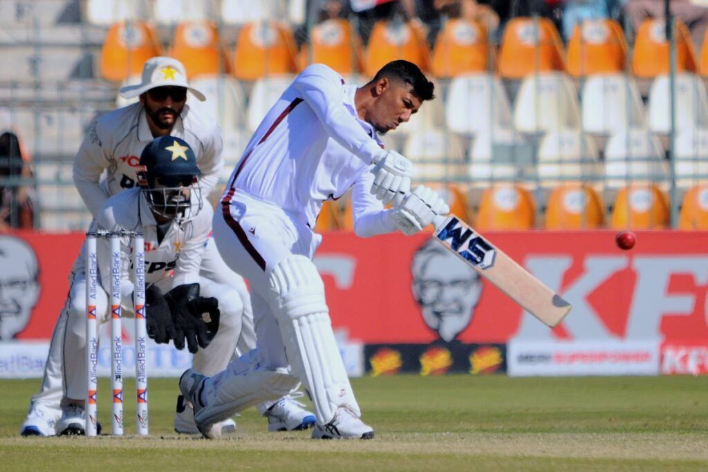 West Indies Gudakesh Motie plays a shot as Pakistan's wicketkeeper Mohammad Rizwan and Salma Ali Agha watch during the first day of the second Test, in Multan, Pakistan, on January 25, 2025. - AP PHOTO