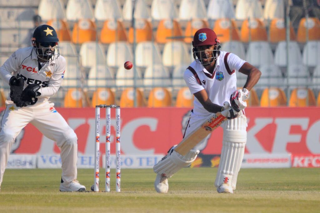 West Indies batsman Kraigg Brathwaite plays a shot as Pakistan's Mohammad Rizwan watches during day two of the second Test match, in Multan, Pakistan, January 26. - AP PHOTO