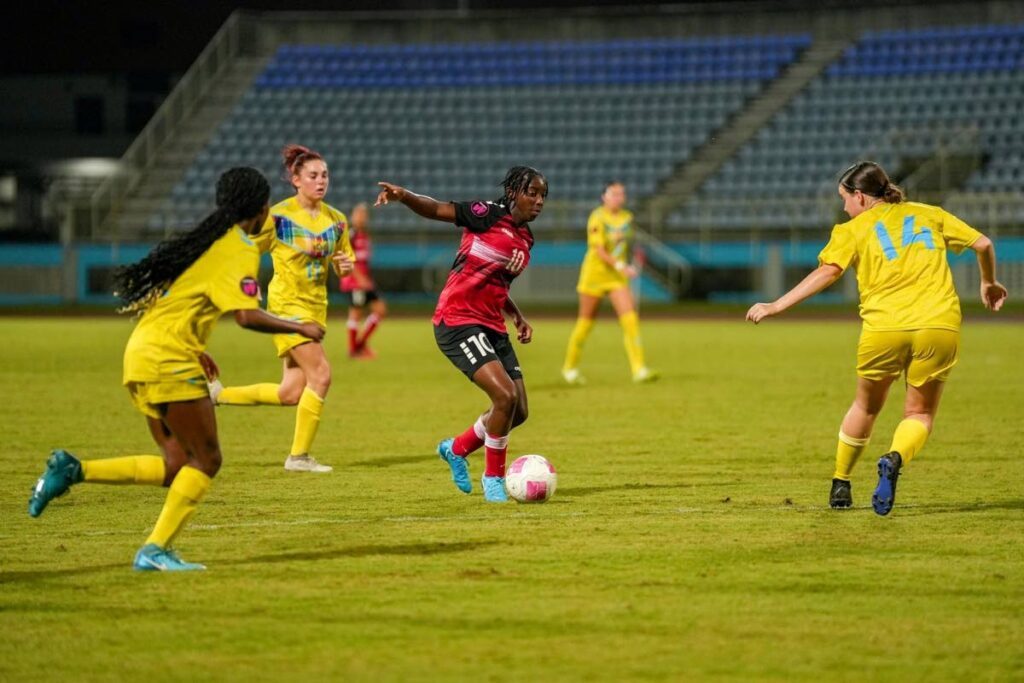 Trinidad and Tobago under-17 women's team attacker Orielle Martin takes on the US Virgin Islands defence during their Concacaf qualifier at the Ato Boldon Stadium in Couva on January 27. - Photo courtesy TTFA.  