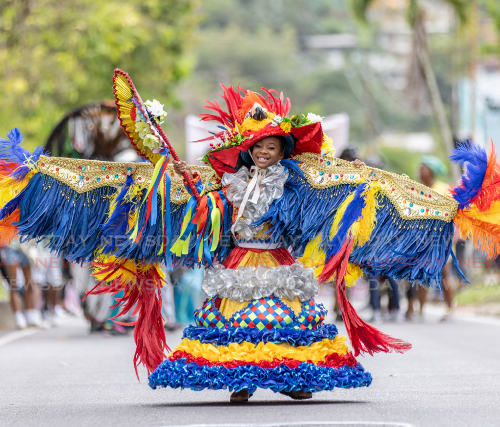 Farinha McKenzie, 7, portrays Mystique Guacamaya: A Tribute To Karen Hart with the band 'D Melting Pot at the Diego Martin Children's Carnival 2025 parade of the bands on the Wendy FItzwilliam Boulevard, Diamond Vale, on February 15. - Photo by Jeff K Mayers