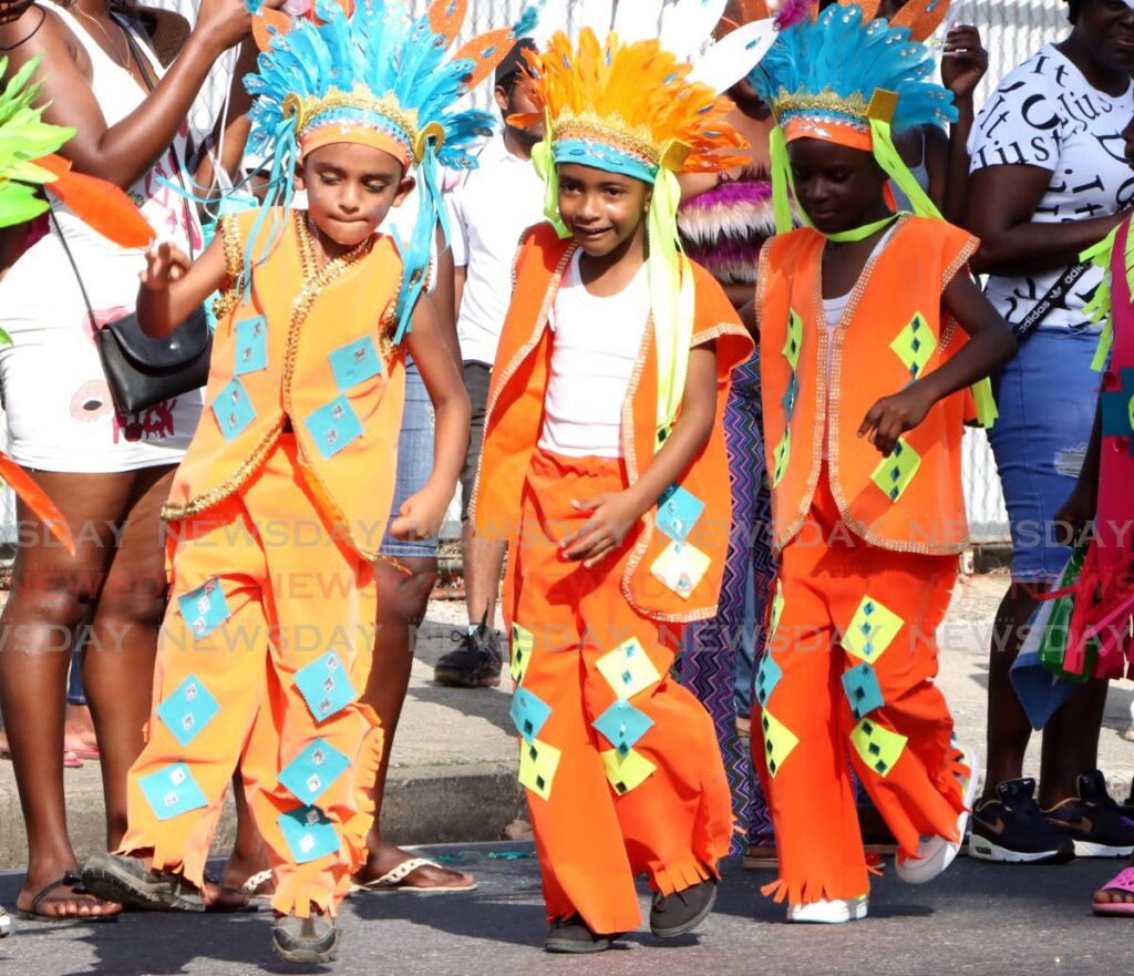 Young masqueraders enjoy themselves while crossing the stage with during the St James Children's Carnival parade Western Main Road, St James on February 4, 2024. - File photo by Ayanna Kinsale 